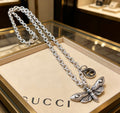 Double-G Emblem Pendant Necklace in Polished Metal-Tone – Design 071 main product view