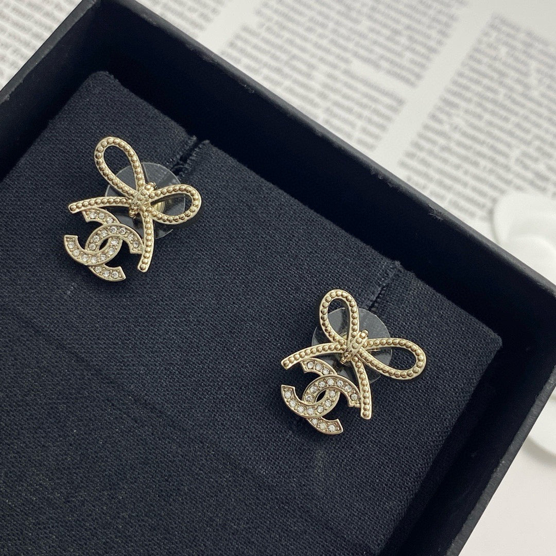 Double-C Emblem Stud Earrings in Polished Metal-Tone – Design 115 main product view
