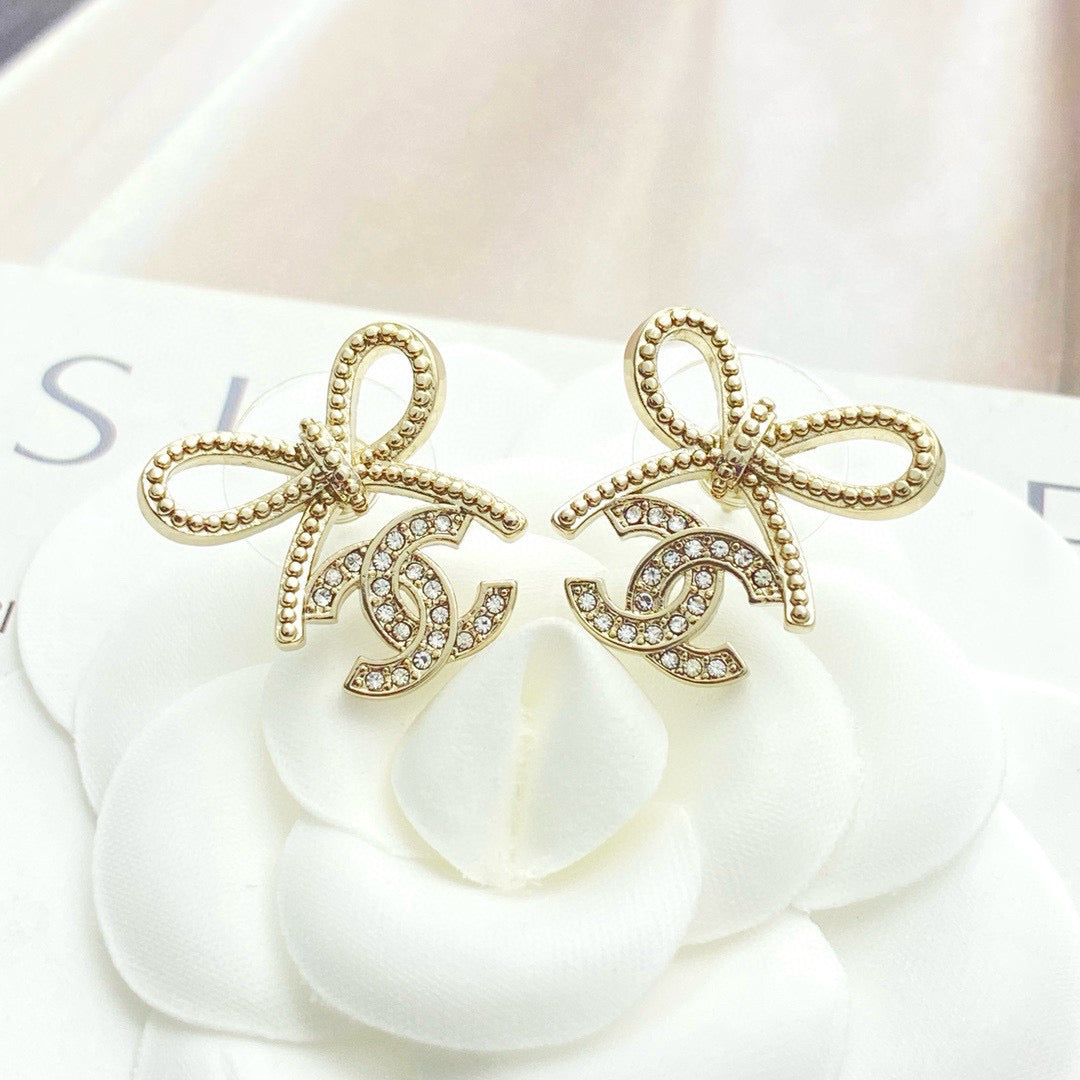Double-C Emblem Stud Earrings in Polished Metal-Tone – Design 115 side detail