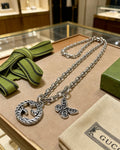 Double-G Emblem Pendant Necklace in Polished Metal-Tone – Design 065 main product view