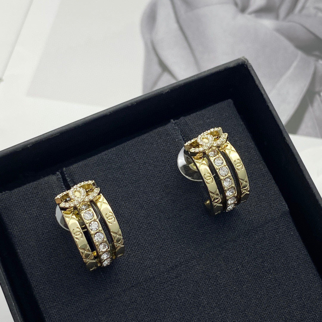 Signature Emblem Crystal-Accent Stud Earrings – Design 007 close-up detail