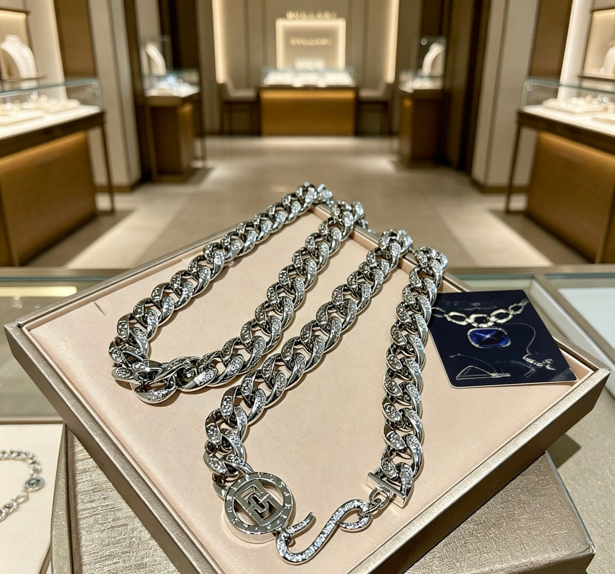 Martin Graham pendant necklace in polished metal-tone – close-up detail