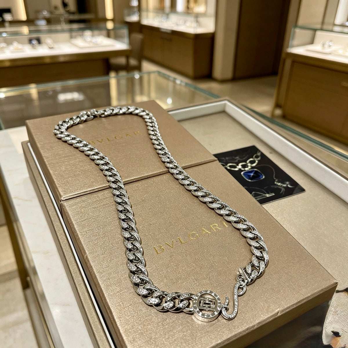 Martin Graham pendant necklace in polished metal-tone – side detail