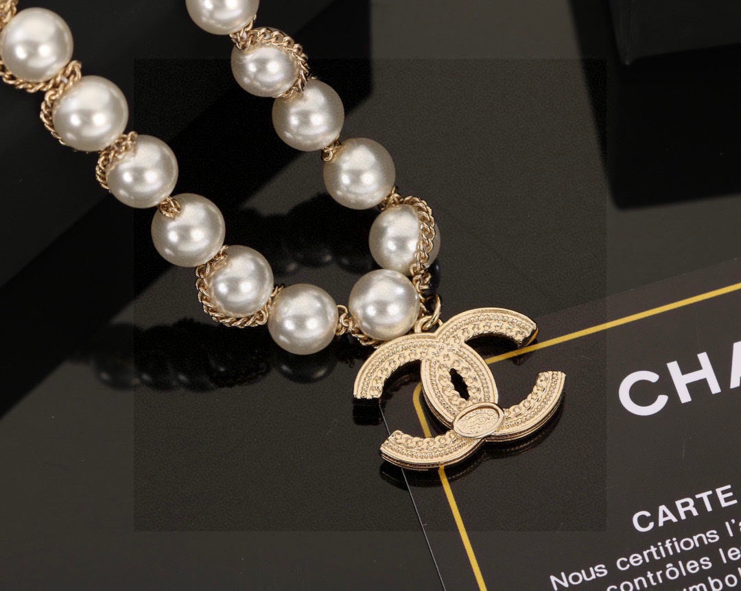 Double-C Emblem Bracelet in Polished Metal-Tone – Pearl Detail – Design 002 side detail