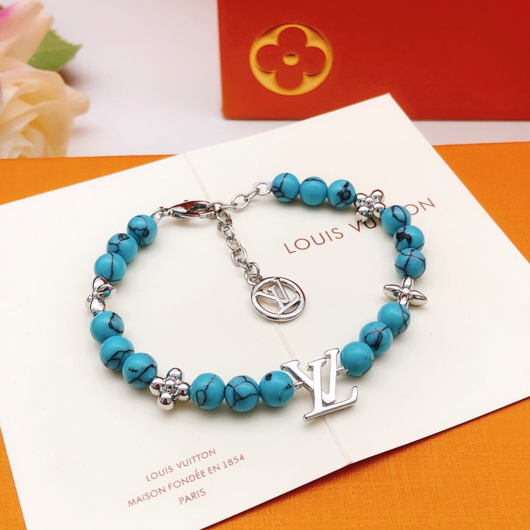 Geometric Emblem Bracelet in Gold-Tone – Blue Detail – Design 002 detail view