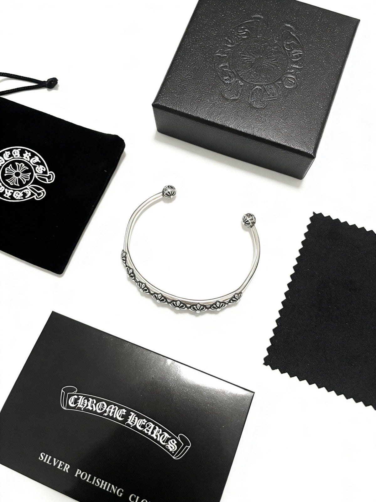 Signature Emblem Bangle in Polished Metal-Tone – Design 007 close-up detail