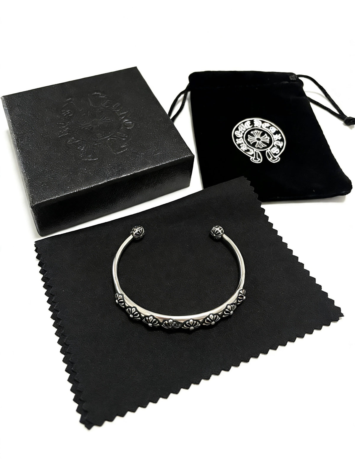 Signature Emblem Bangle in Polished Metal-Tone – Design 007 front product view