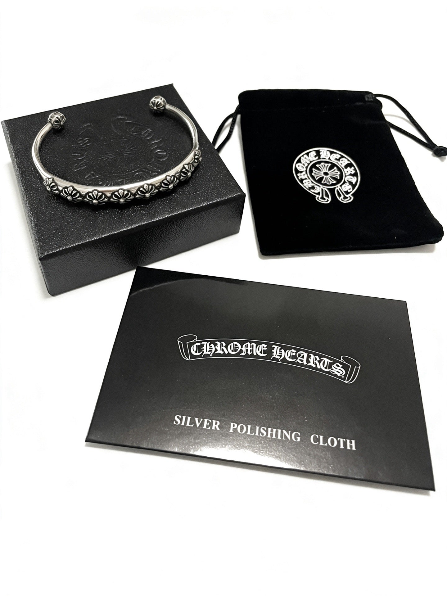 Signature Emblem Bangle in Polished Metal-Tone – Design 007 front product view
