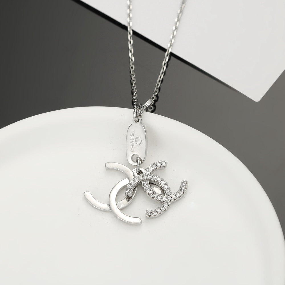 Double-C Emblem Pendant Necklace in Polished Metal-Tone – Design 001 styled product view