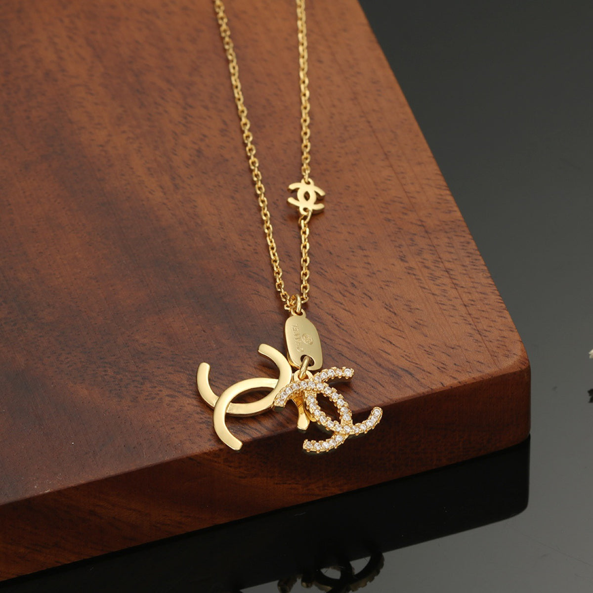 Double-C Emblem Pendant Necklace in Polished Metal-Tone – Design 002 detail view