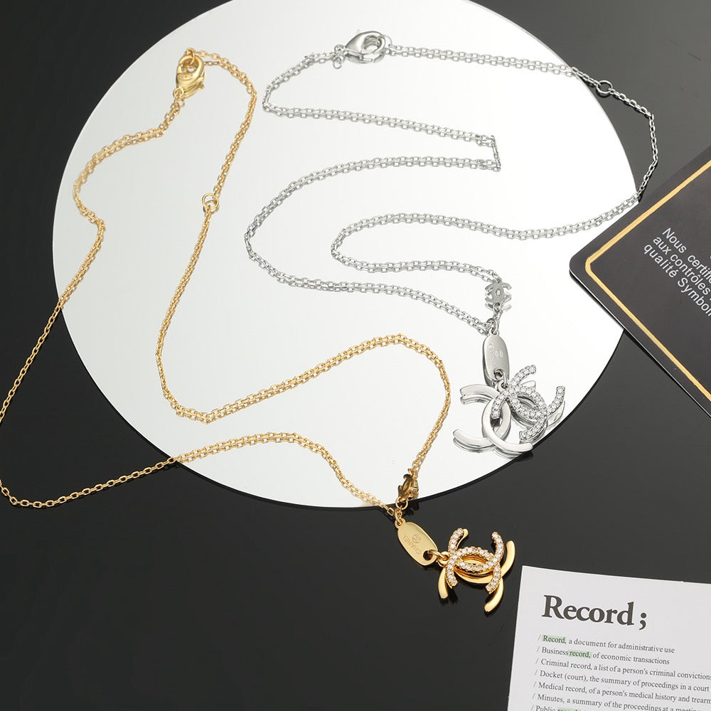 Double-C Emblem Pendant Necklace in Polished Metal-Tone – Design 002 main product view
