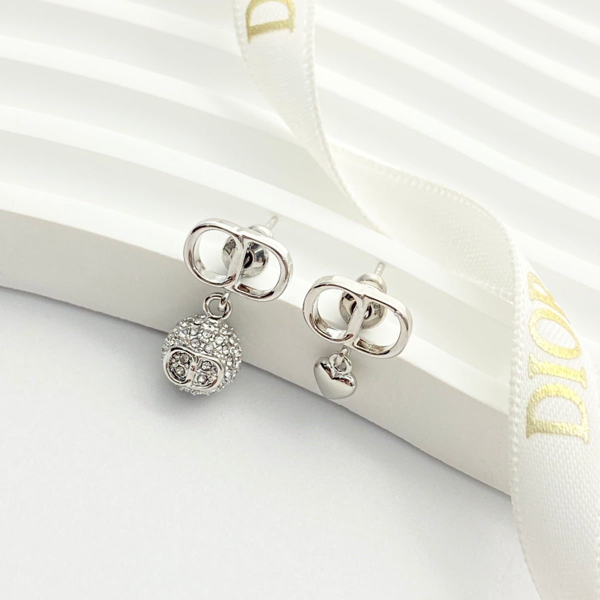 Heart Motif Stud Earrings in Silver-Tone with Crystal-Style Accents close-up detail