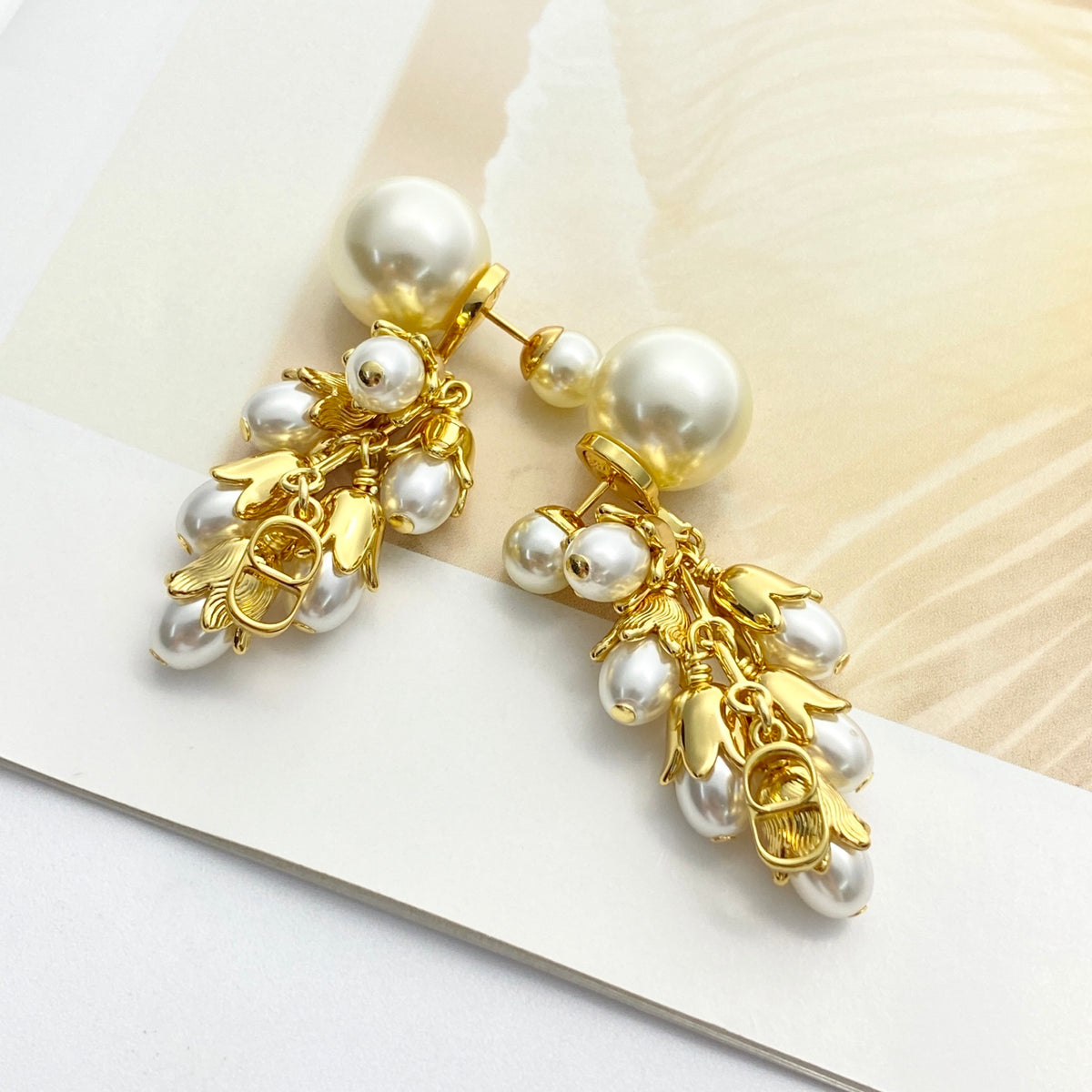 Pearl-Style Motif Stud Earrings in Polished Metal-Tone with Pearl-Style Detail – Design 003 close-up detail
