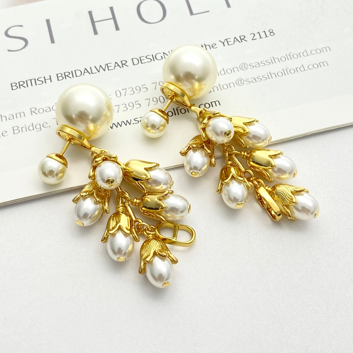 Pearl-Style Motif Stud Earrings in Polished Metal-Tone with Pearl-Style Detail – Design 003 front view