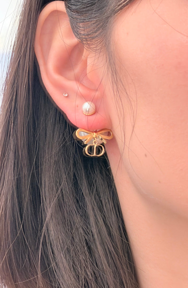 Bow & Butterfly Motif Stud Earrings in Gold-Tone with Pearl-Style Detail – Design 001 detail view