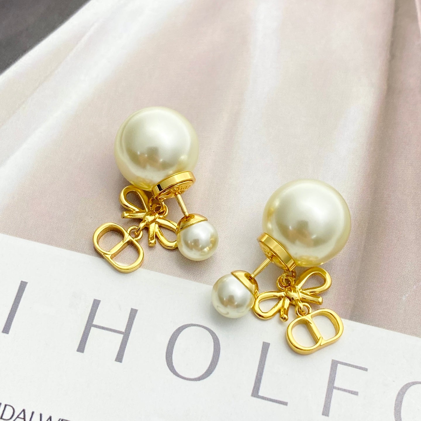 Bow & Butterfly Motif Stud Earrings in Gold-Tone with Pearl-Style Detail – Design 001 detail view