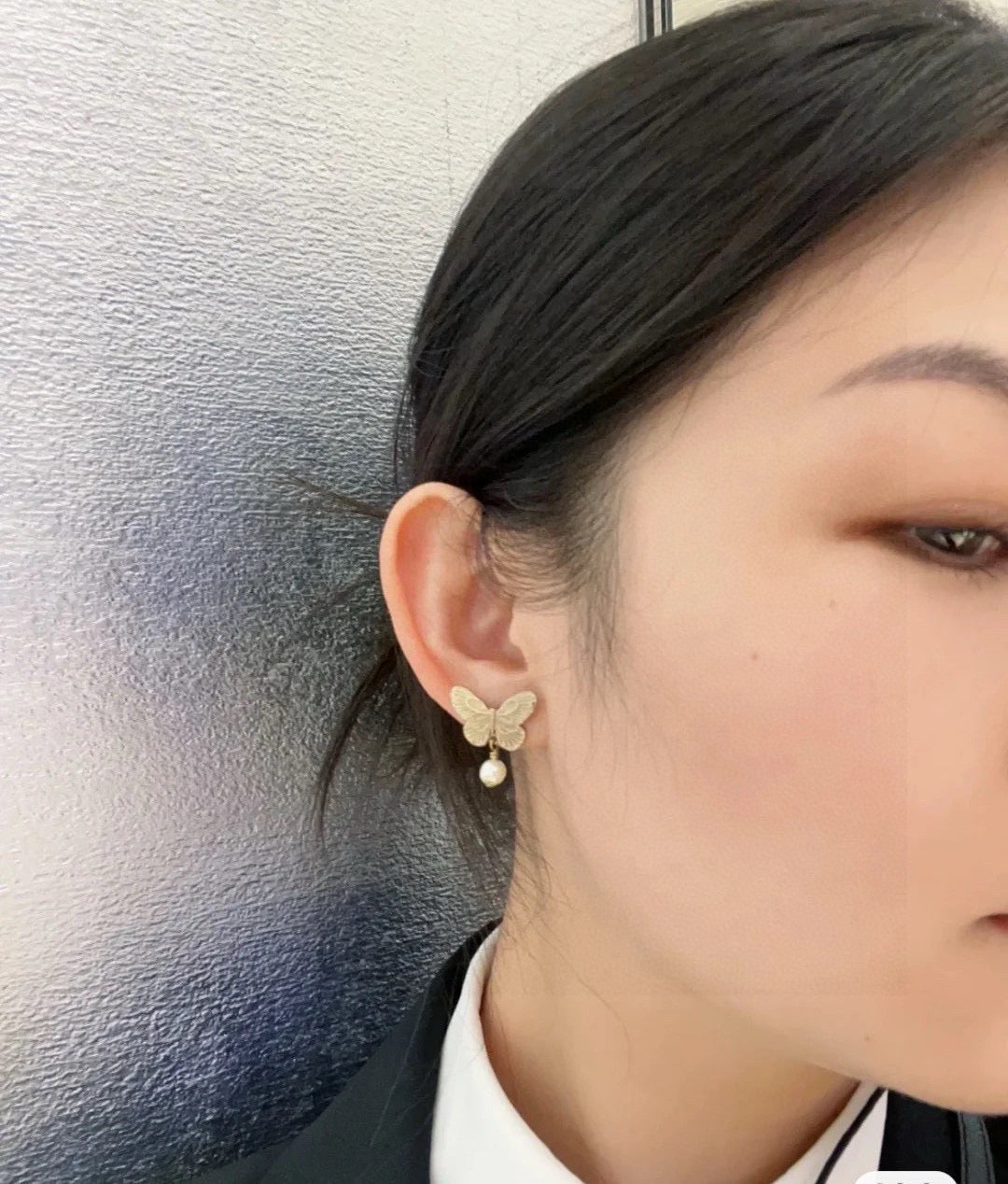 Bow & Butterfly Motif Stud Earrings in Silver-Tone with Asymmetric Detail – Design 001 close-up detail