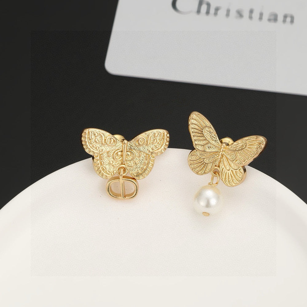 Bow & Butterfly Motif Stud Earrings in Silver-Tone with Asymmetric Detail – Design 002 main product view