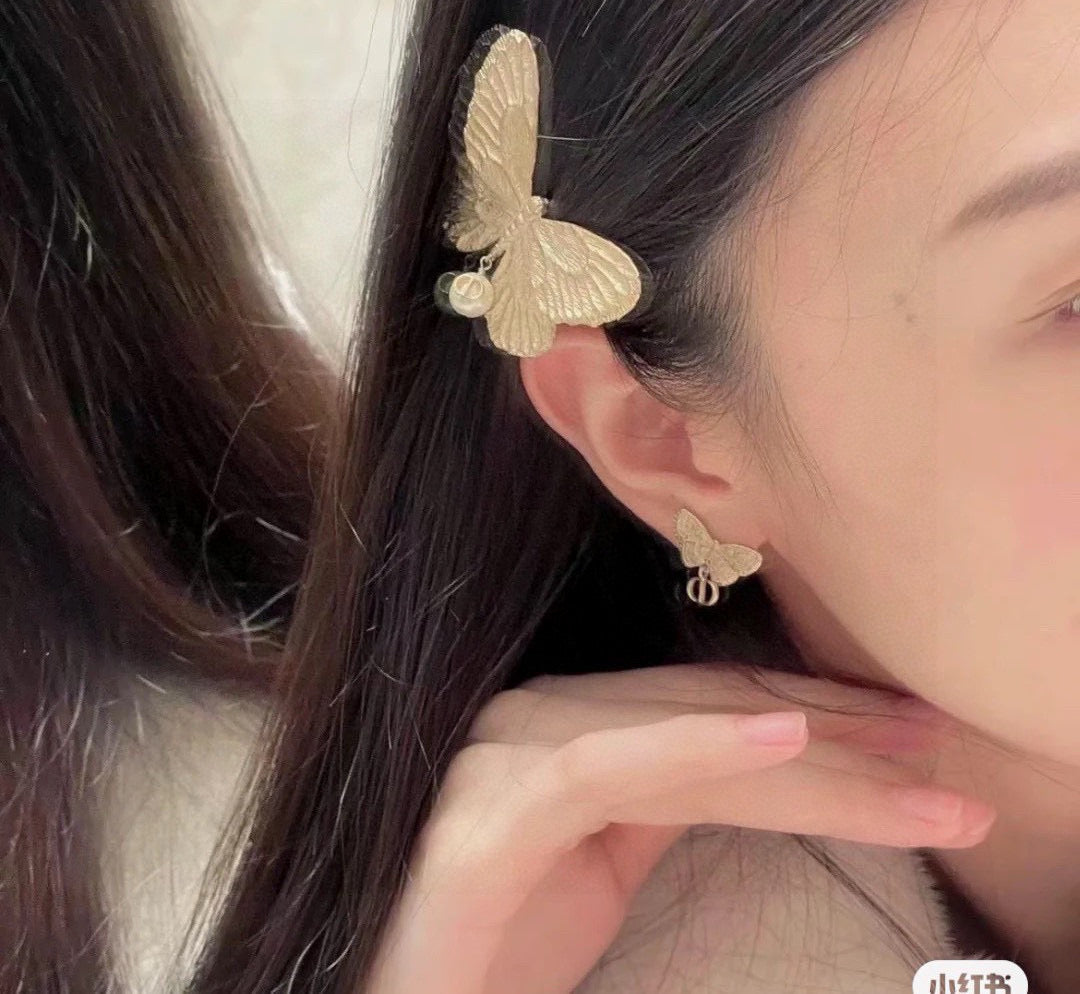 Bow & Butterfly Motif Stud Earrings in Silver-Tone with Asymmetric Detail – Design 002 styled view