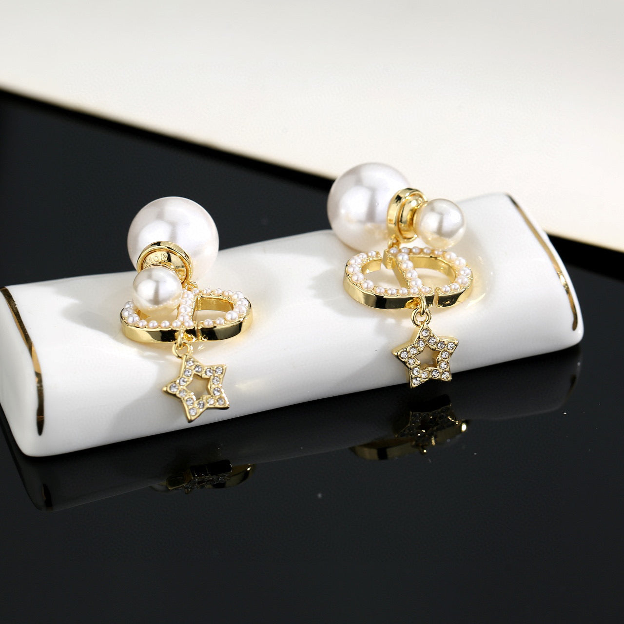 Pearl-Style Motif Stud Earrings in Polished Metal-Tone with Pearl-Style Detail – Design 001 styled view