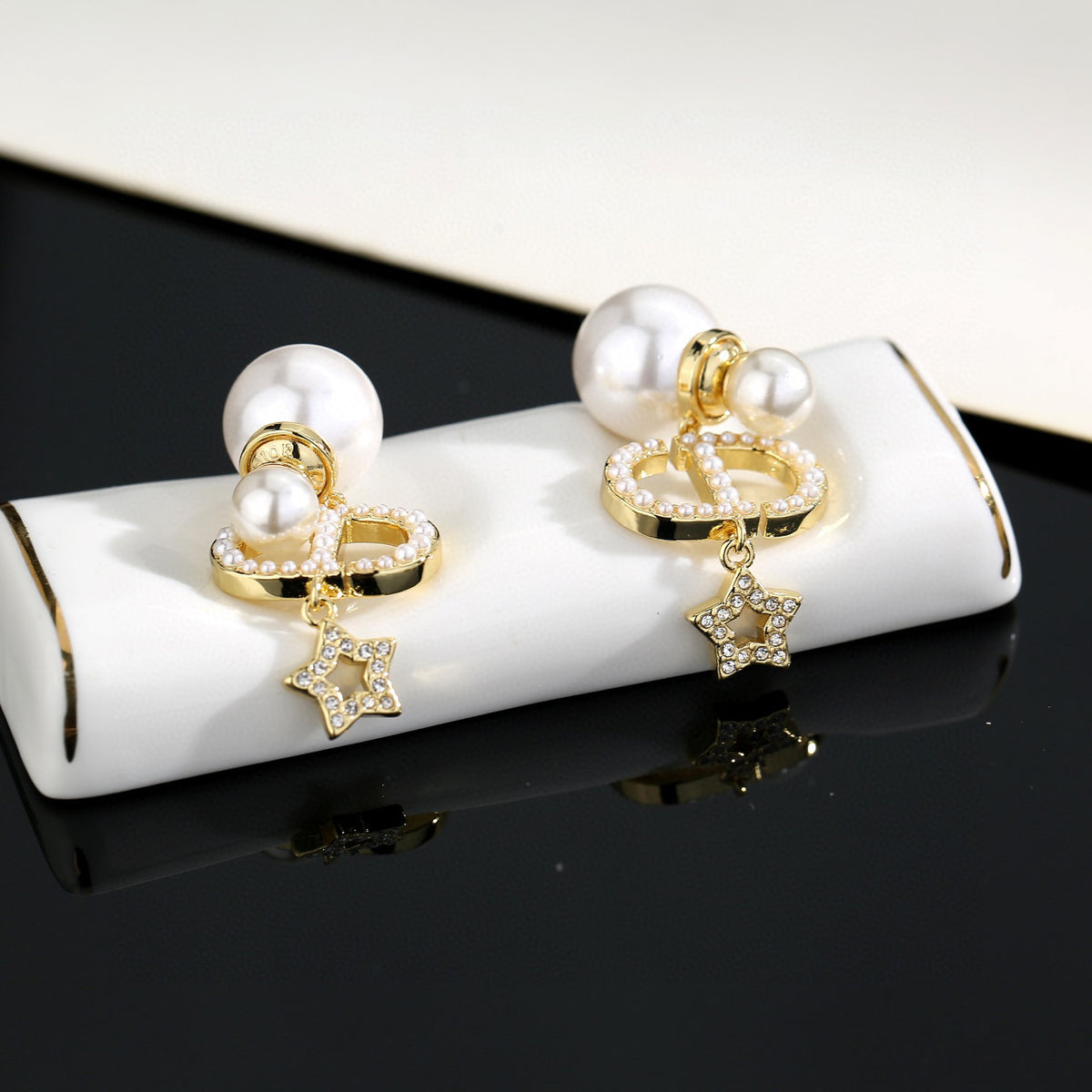 Pearl-Style Motif Stud Earrings in Polished Metal-Tone with Pearl-Style Detail – Design 001 styled view