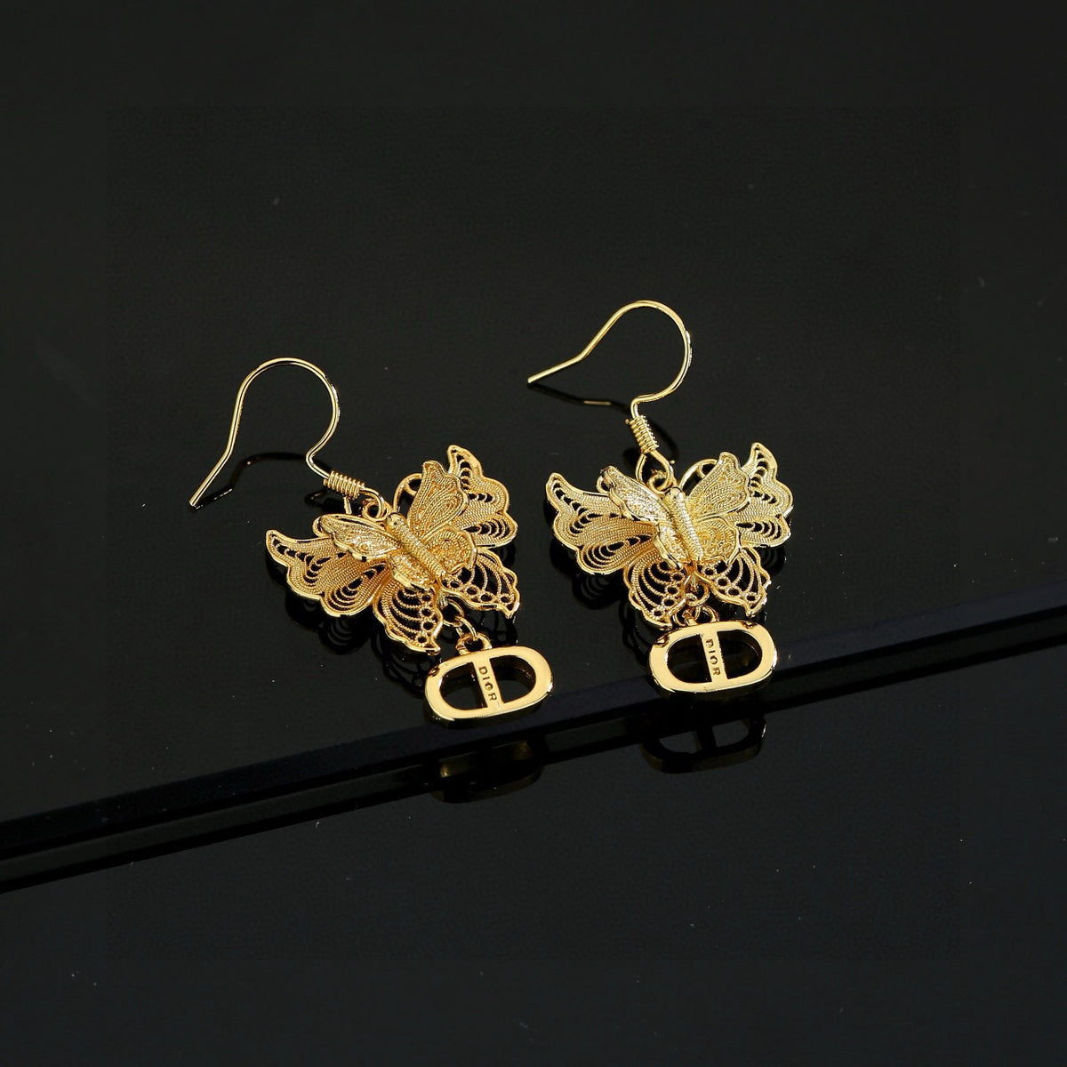 Bow & Butterfly Motif Stud Earrings in Polished Metal-Tone – Design 001 detail view