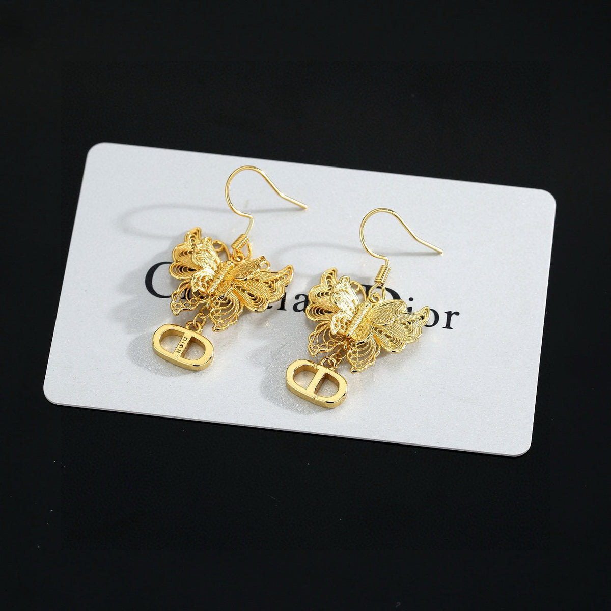 Bow & Butterfly Motif Stud Earrings in Polished Metal-Tone – Design 001 styled view
