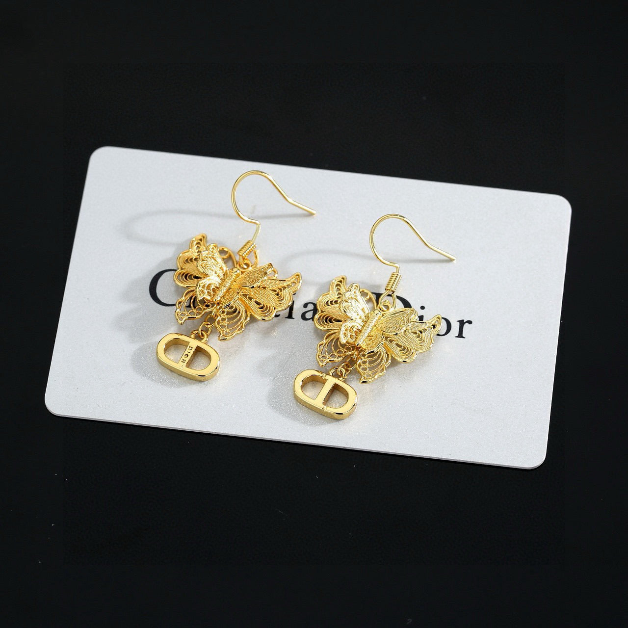 Bow & Butterfly Motif Stud Earrings in Polished Metal-Tone – Design 002 styled view