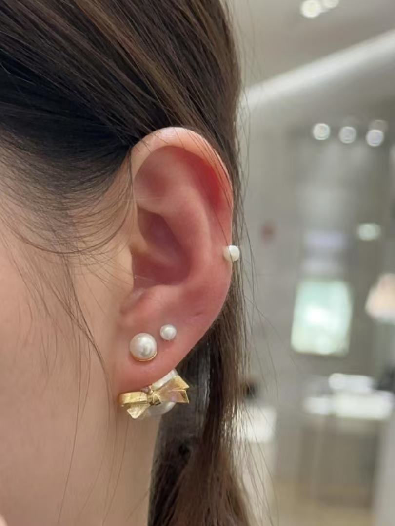 Bow & Butterfly Motif Statement Earrings in Polished Metal-Tone with Pearl-Style Detail – Design 002 front view