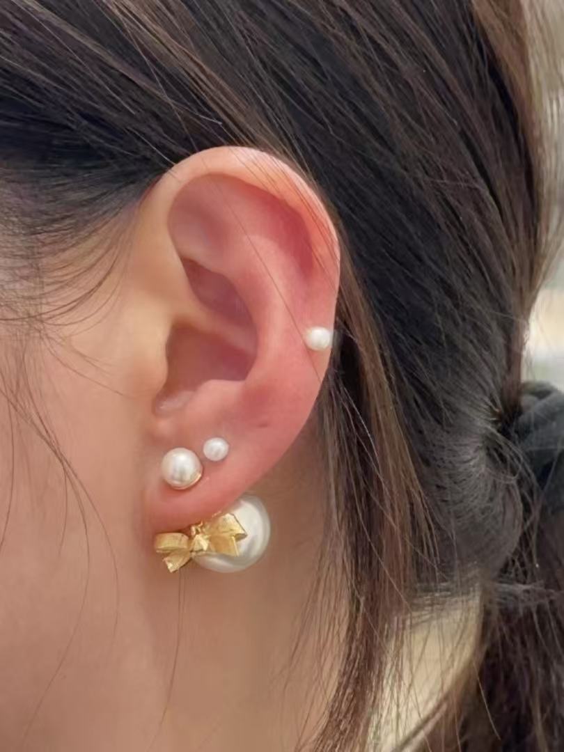 Bow & Butterfly Motif Statement Earrings in Polished Metal-Tone with Pearl-Style Detail – Design 002 main product view