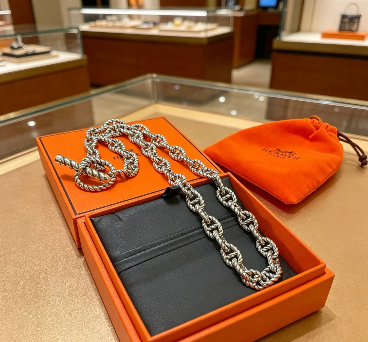 Martin Graham pendant necklace in polished metal-tone – side detail