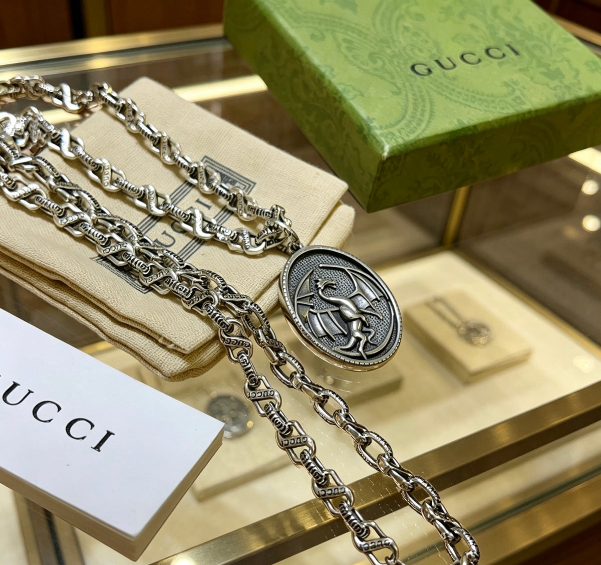 Double-G Emblem Pendant Necklace in Polished Metal-Tone – Design 019 detail view