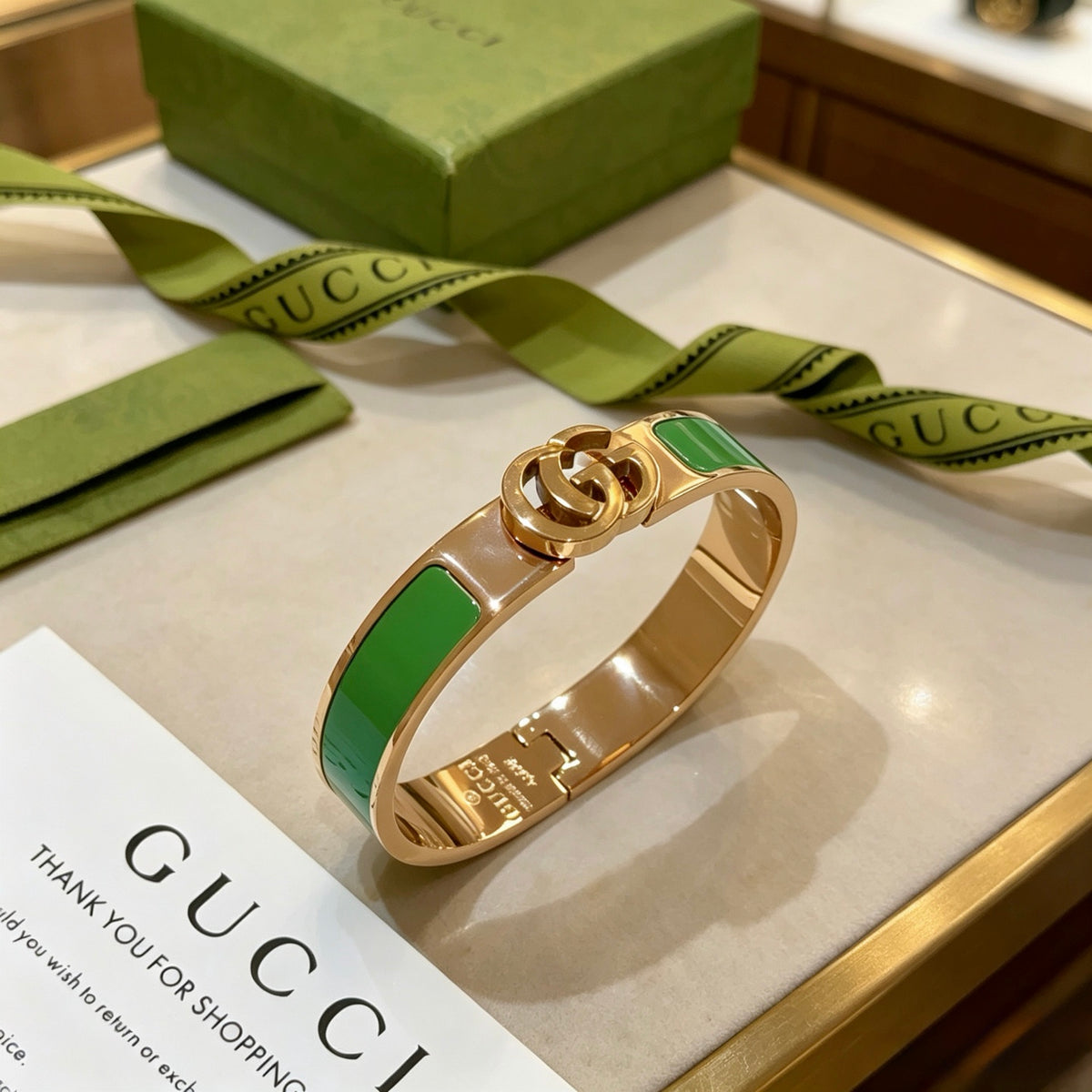 Double-G Emblem Bangle in Gold-Tone – Design 002 close-up detail
