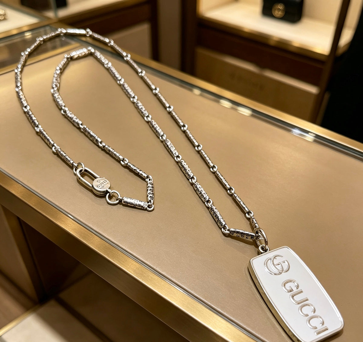 Double-G Emblem Pendant Necklace in Polished Metal-Tone – Design 015 detail view