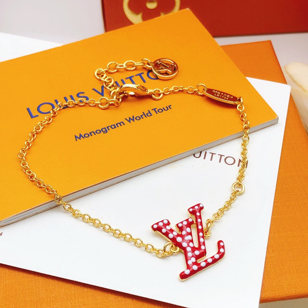 Geometric Emblem Bracelet in Gold-Tone – Red Detail side detail