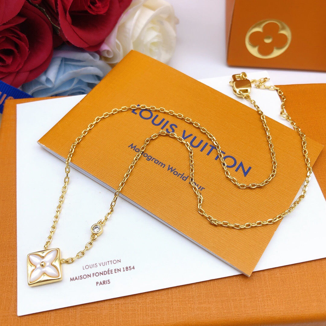 Geometric Emblem Pendant Necklace in Gold-Tone – White Detail side detail