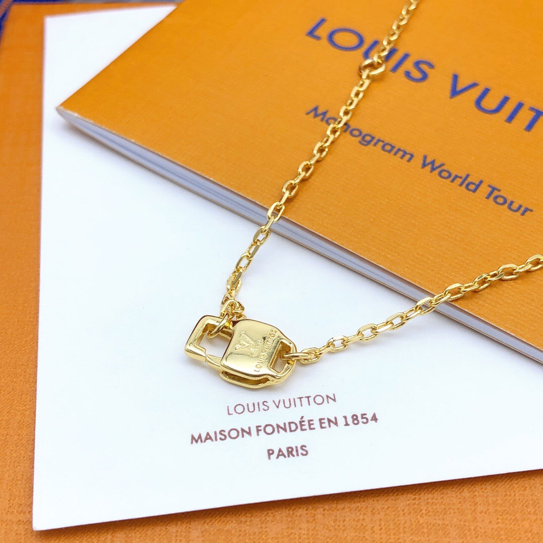 Geometric Emblem Pendant Necklace in Gold-Tone – White Detail close-up detail