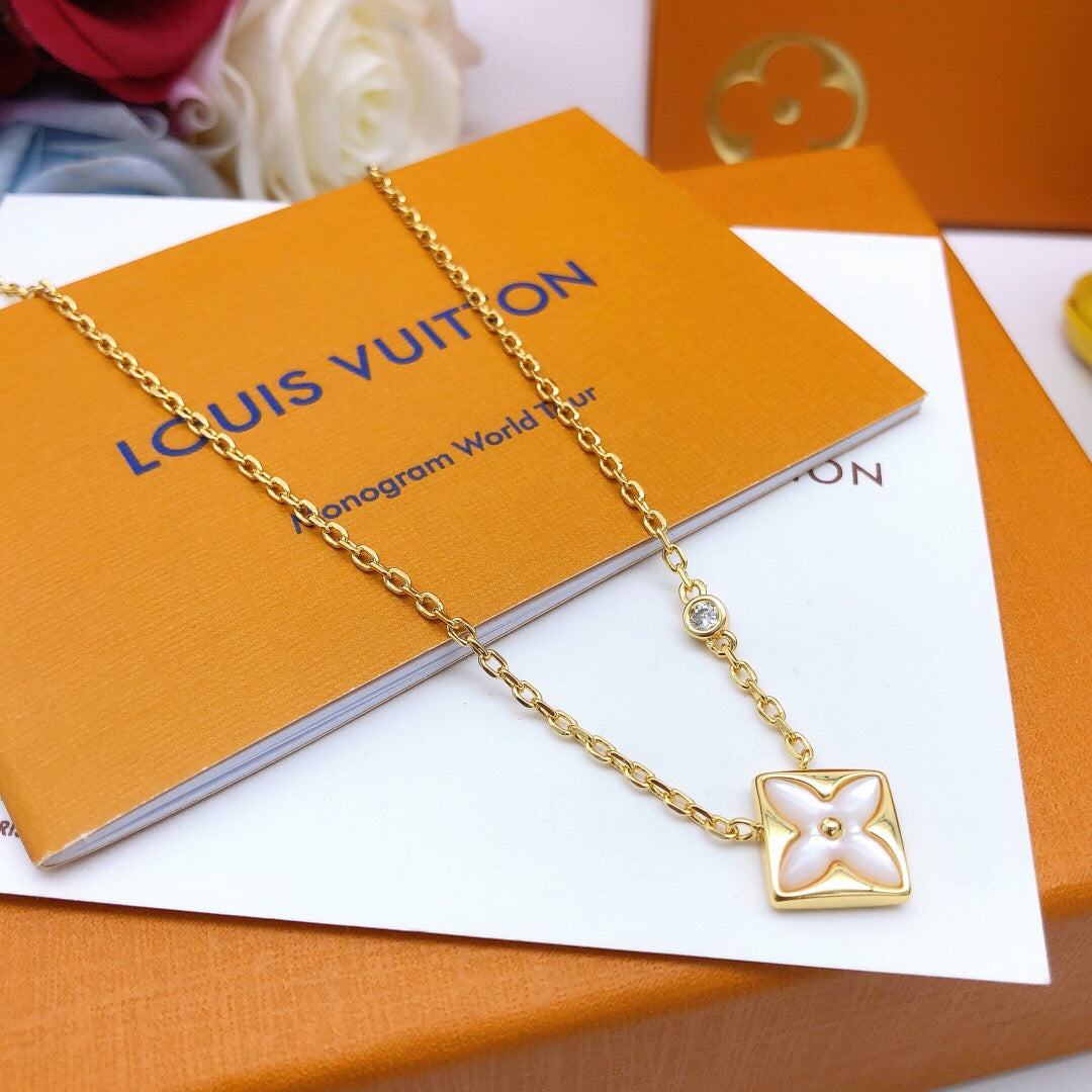 Geometric Emblem Pendant Necklace in Gold-Tone – White Detail main product view