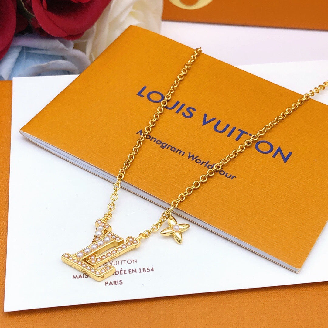 Geometric Emblem Pendant Necklace in Polished Metal-Tone – Pearl Detail detail view