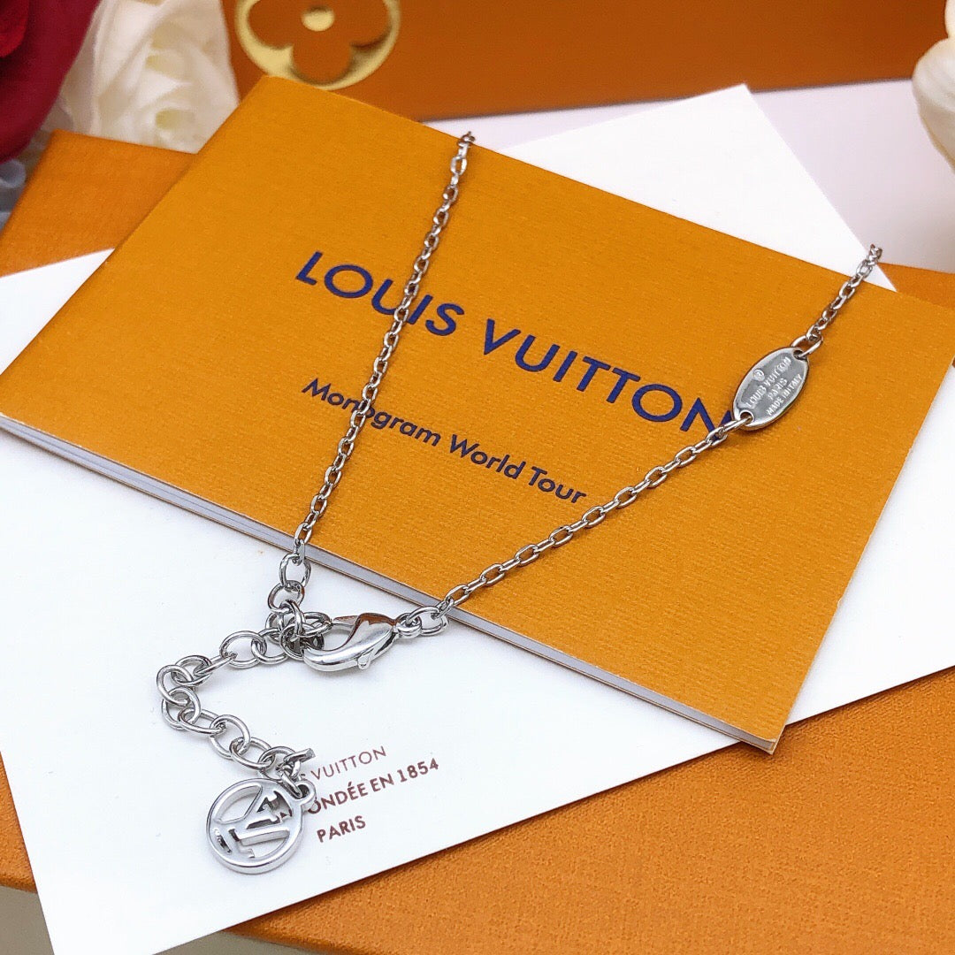 Geometric Emblem Pendant Necklace in Silver-Tone – Silver Detail close-up detail