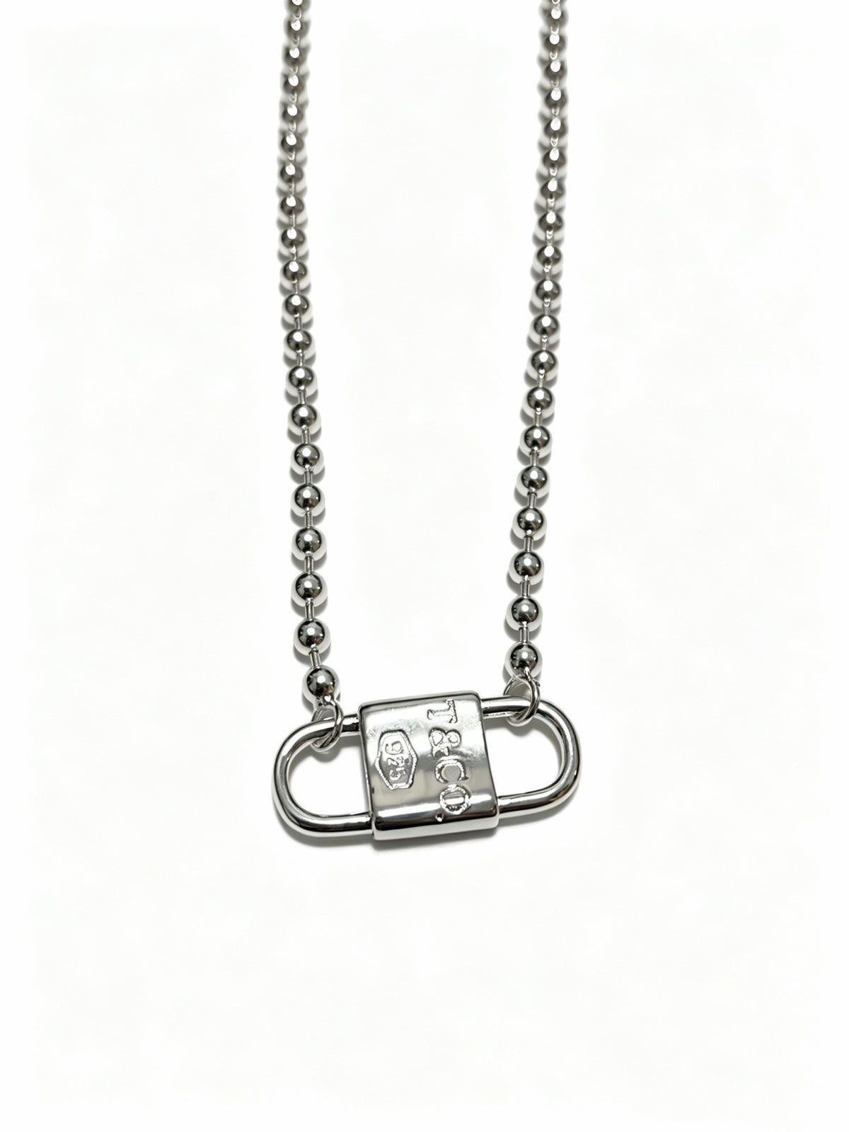 Signature Motif Pendant Necklace in Silver-Tone – Vintage Detail detail view