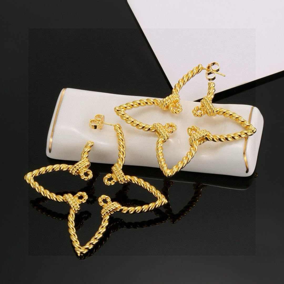 Clover Stud Earrings in Polished Metal-Tone – Clover Detail front product view