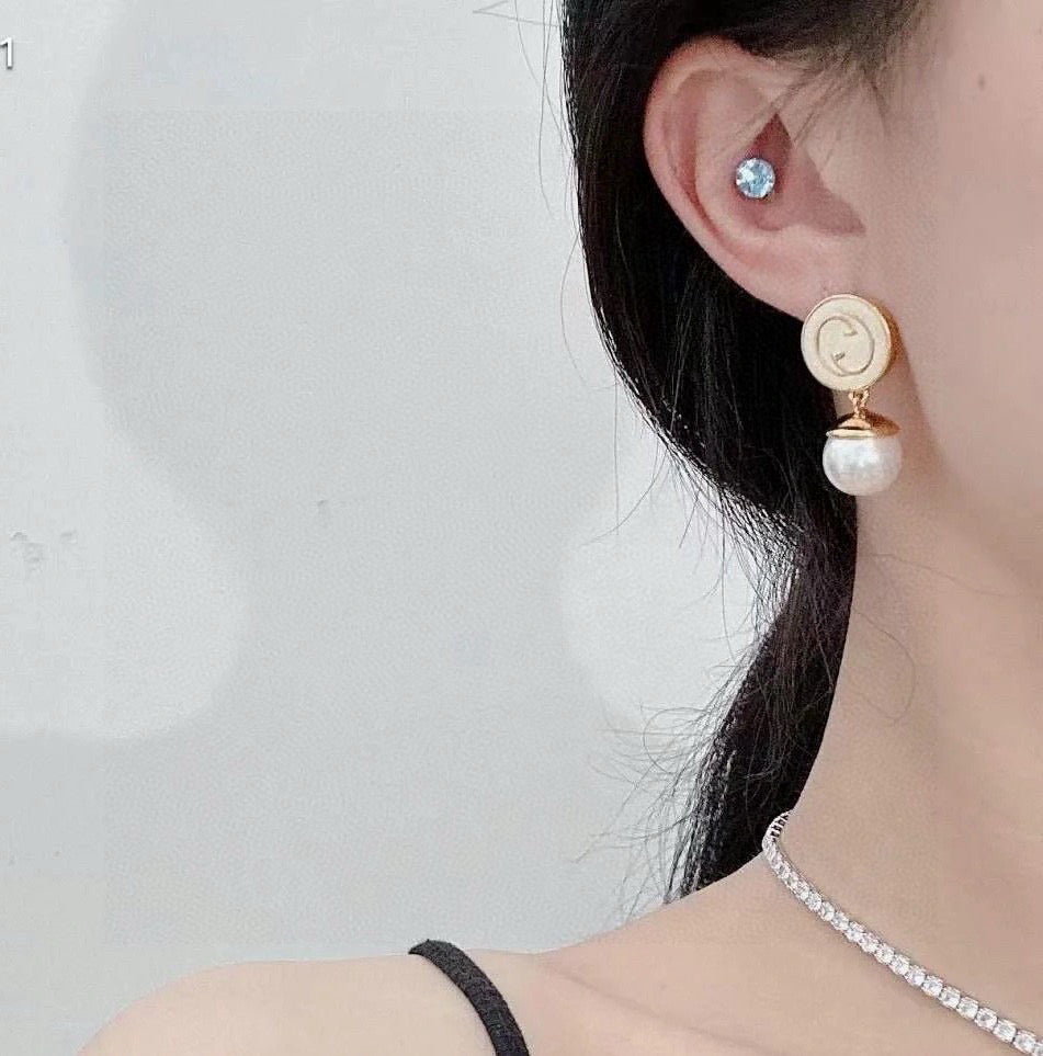 Geometric Emblem Stud Earrings in Polished Metal-Tone – Design 005 detail view