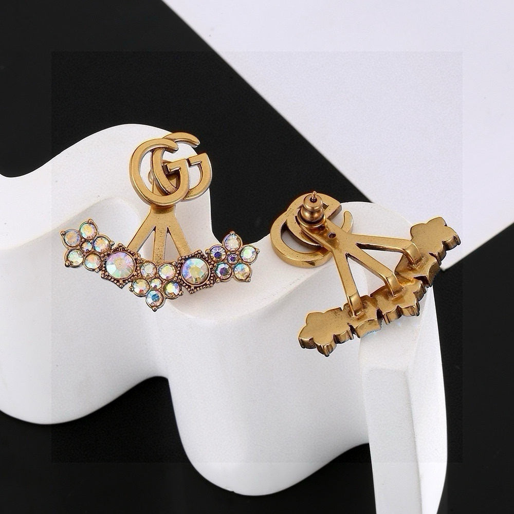 Double-G Emblem Stud Earrings in Gold-Tone – Design 004 close-up detail