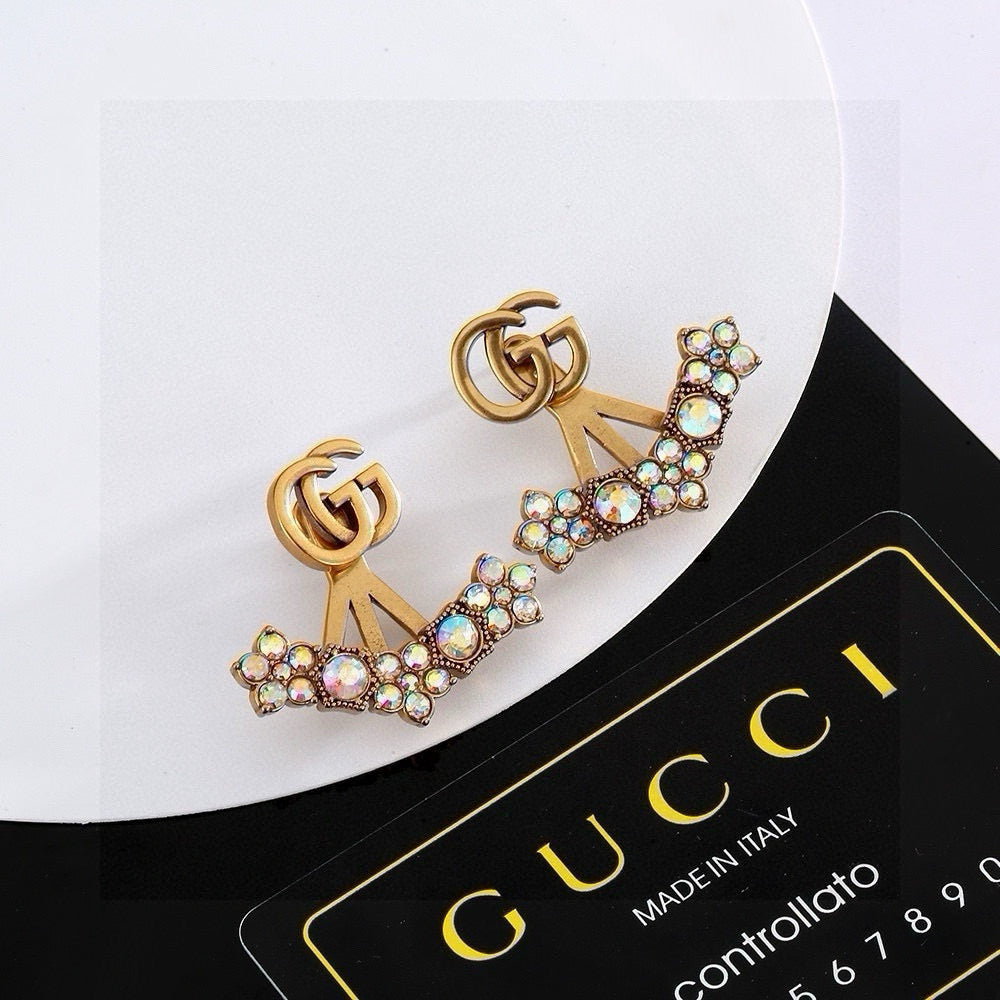 Double-G Emblem Stud Earrings in Gold-Tone – Design 004 detail view