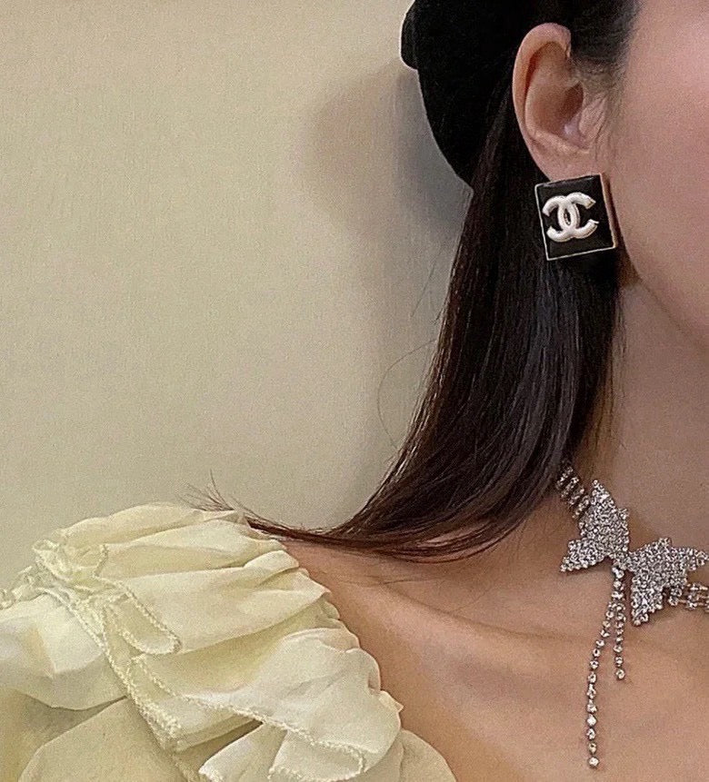 Double-C Emblem Stud Earrings in Gold-Tone – Design 003 front product view