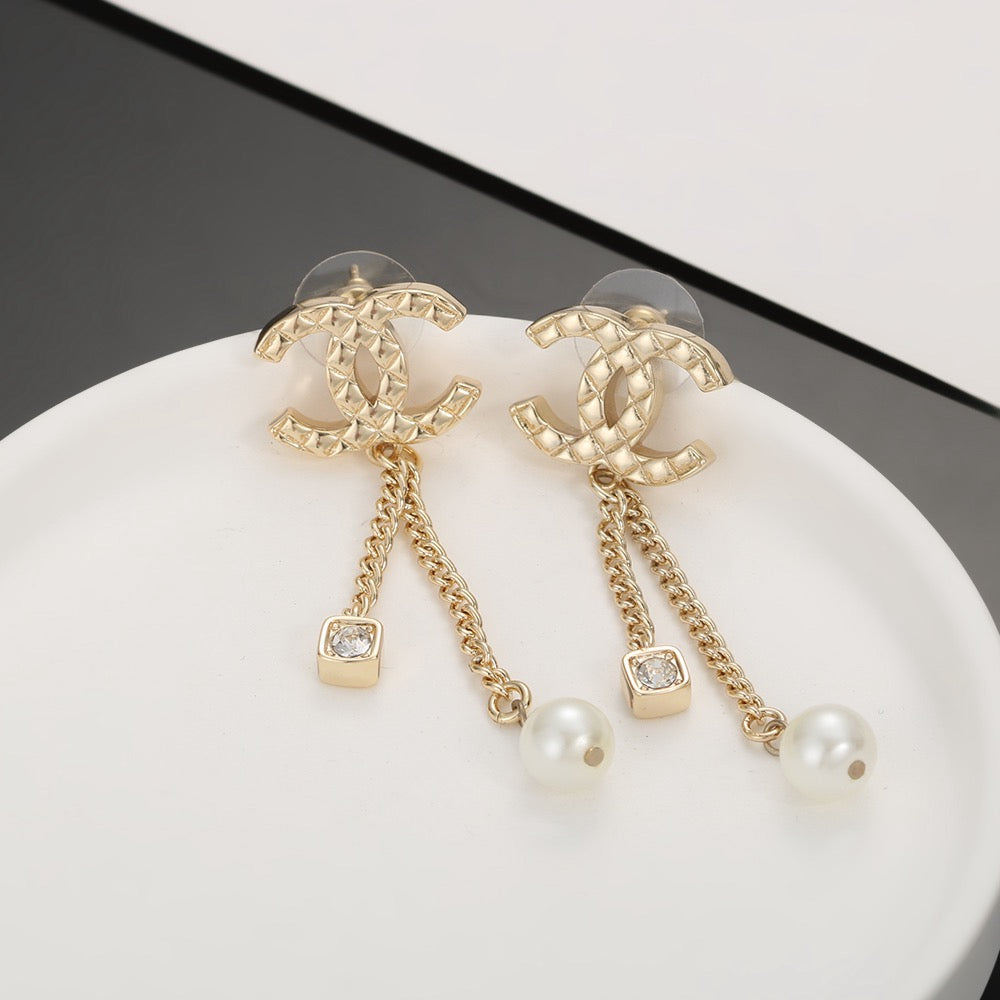 Signature Emblem Stud Earrings in Silver-Tone – Design 002 close-up detail