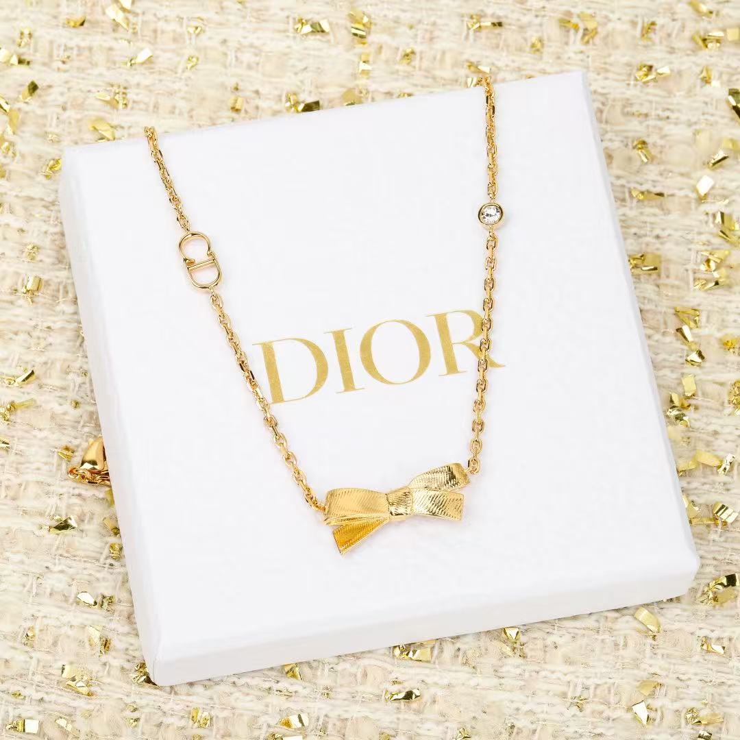Bow & Butterfly Motif Pendant Necklace in Polished Metal-Tone – Design 001 front view