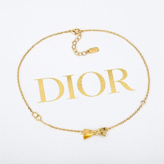 Bow & Butterfly Motif Pendant Necklace in Polished Metal-Tone – Design 001 main product view