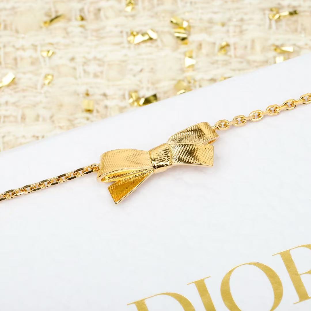 Bow & Butterfly Motif Pendant Necklace in Polished Metal-Tone – Design 001 close-up detail